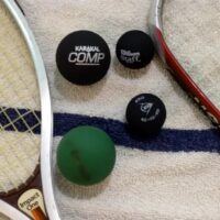 Squash ball next to raquetball